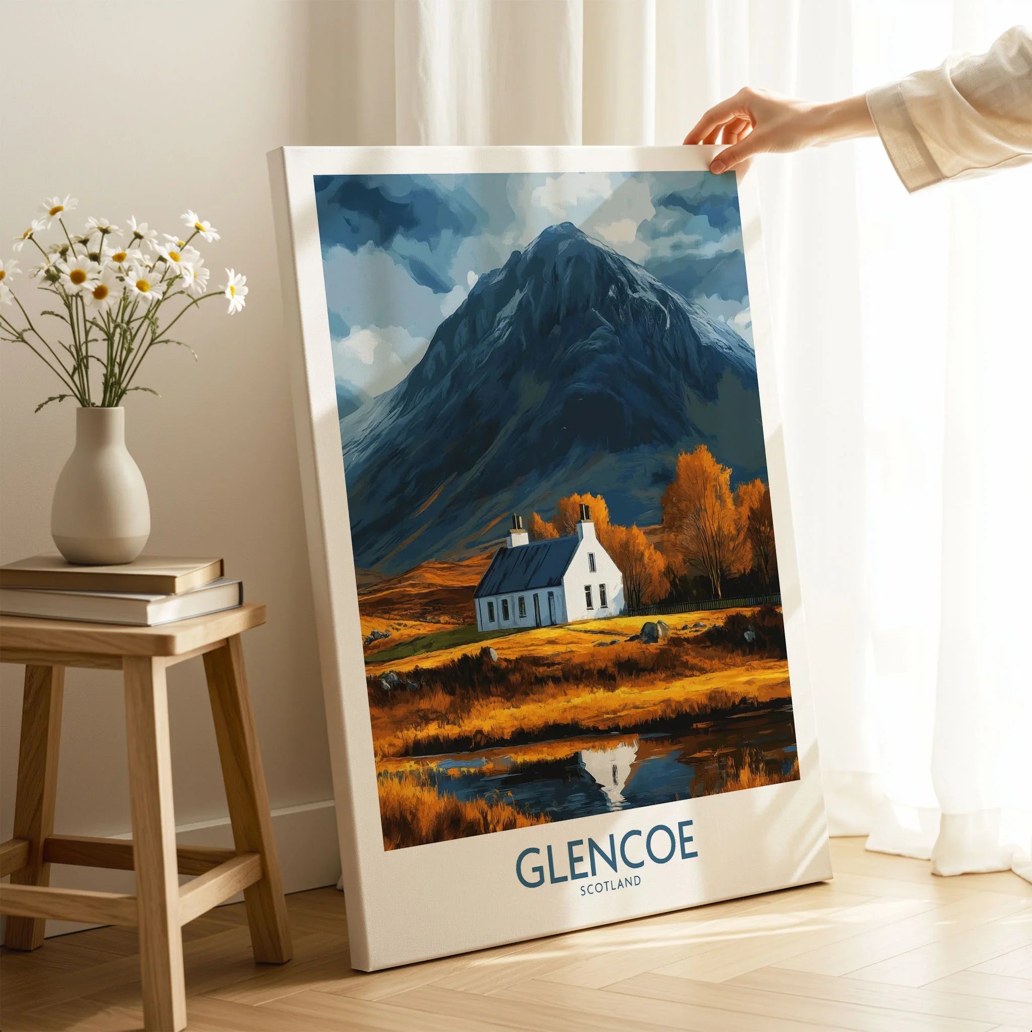Glencoe Scotland Print on stretched canvas with mirror-wrap edges, held by hand in a room setting