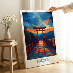 Hakone Wall Art - Japan Travel Poster on stretched canvas with mirror-wrap edges, held by hand in a room setting