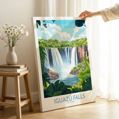 Iguazu Falls Travel Poster on stretched canvas with mirror-wrap edges, held by hand in a room setting