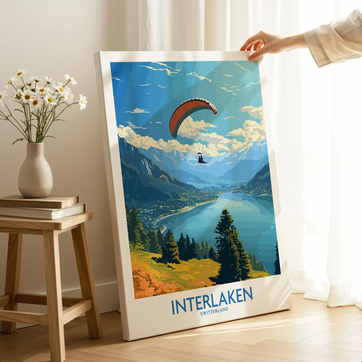 Interlaken Wall Art Print on stretched canvas with mirror-wrap edges, held by hand in a room setting