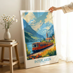 Interlaken Travel Poster on stretched canvas with mirror-wrap edges, held by hand in a room setting