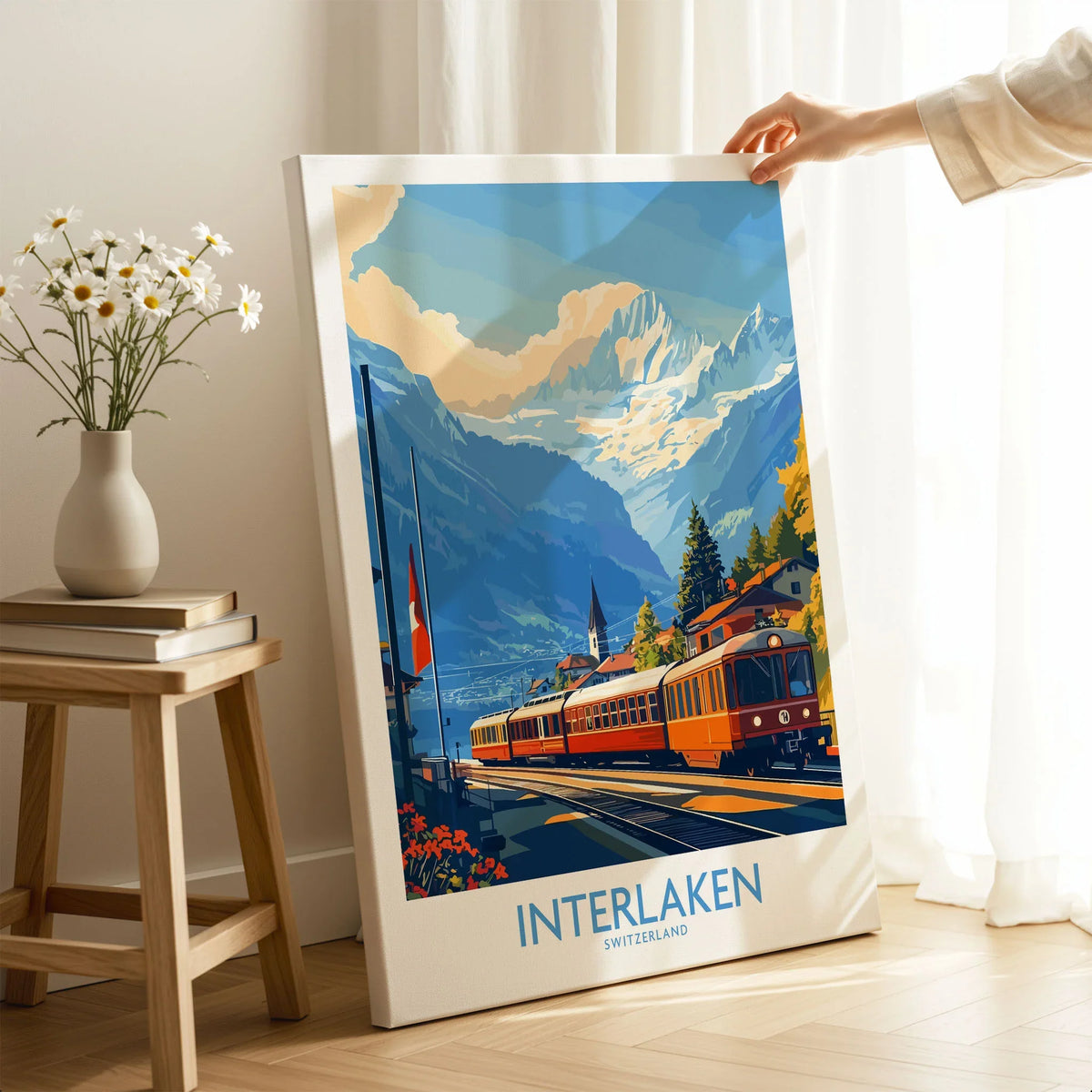 Interlaken Wall Art Print No. 2 on stretched canvas with mirror-wrap edges, held by hand in a room setting