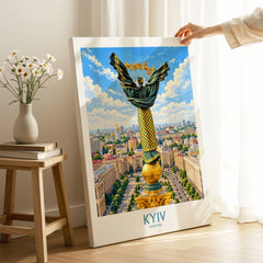 Kyiv Ukraine Maidan Square Wall Art — the Independence Monument rising above Maidan Nezalezhnosti and the Kyiv skyline, shown as canvas print mirror edge hand holding room setting