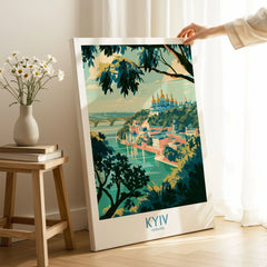 Kyiv Ukraine Dnipro River Wall Art — golden domes on a wooded bluff above the Dnipro river, shown as canvas print mirror edge hand holding room setting