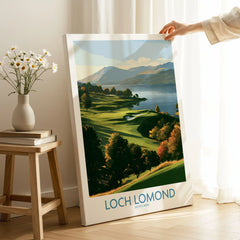 Loch Lomond Scotland Highland View Wall Art — autumn slopes rolling down to Loch Lomond with Highland hills beyond, shown as canvas print mirror edge hand holding room setting