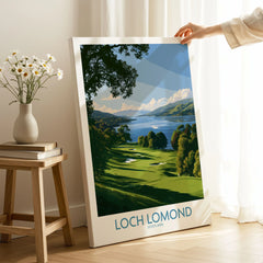 Loch Lomond Scotland Lochside Meadow Wall Art — a sunlit grassy shoreline running down to Loch Lomond under old oaks, shown as canvas print mirror edge hand holding room setting