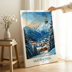 Mayrhofen Ski Poster on stretched canvas with mirror-wrap edges, held by hand in a room setting