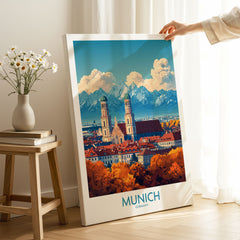 Munich Travel Poster on stretched canvas with mirror-wrap edges, held by hand in a room setting