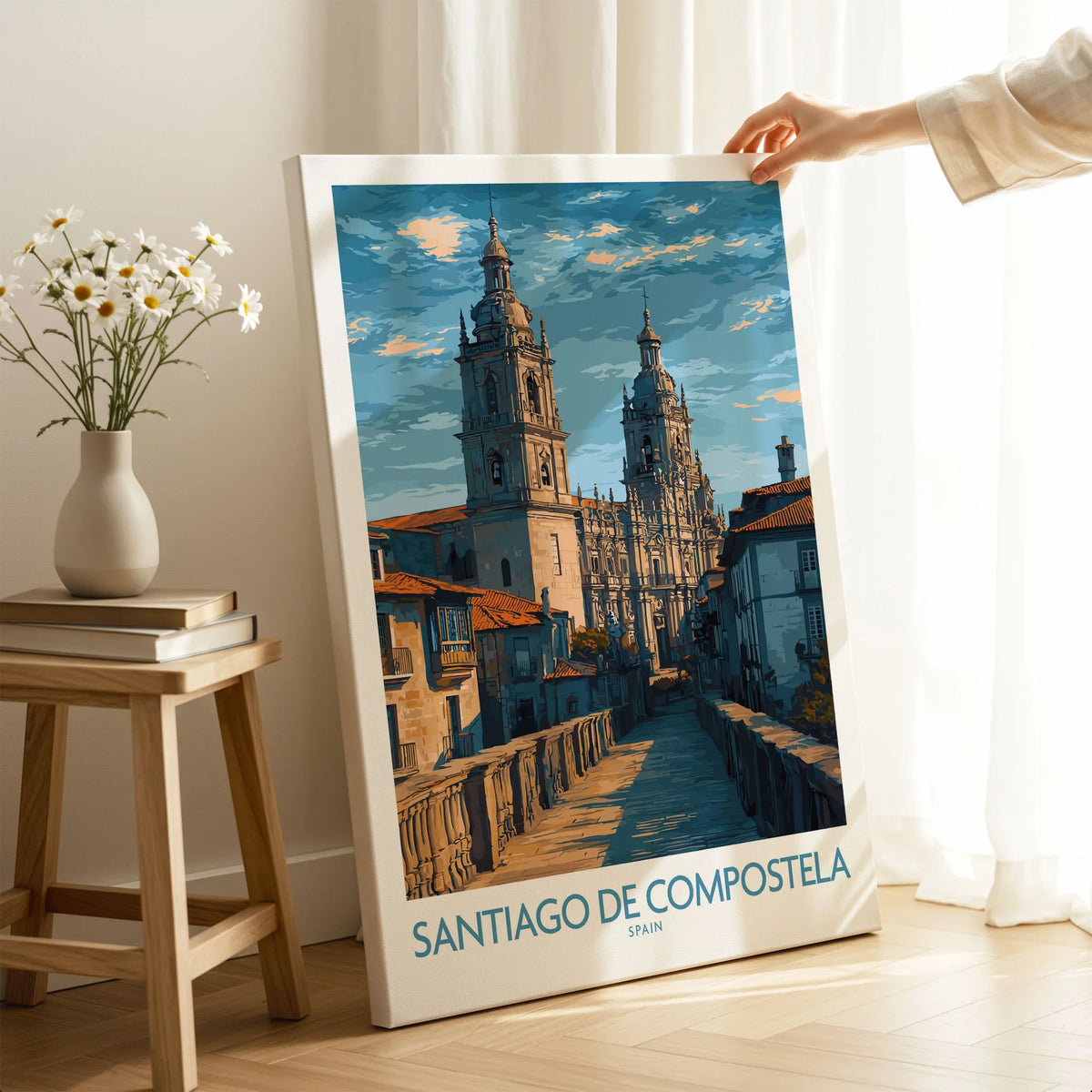 Santiago de Compostela Art Print | Galician Travel Poster on stretched canvas with mirror-wrap edges, held by hand in a room setting