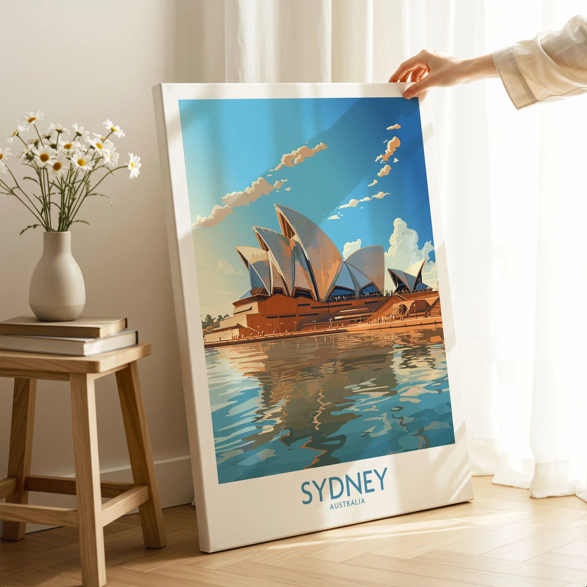 Sydney Print on stretched canvas with mirror-wrap edges, held by hand in a room setting