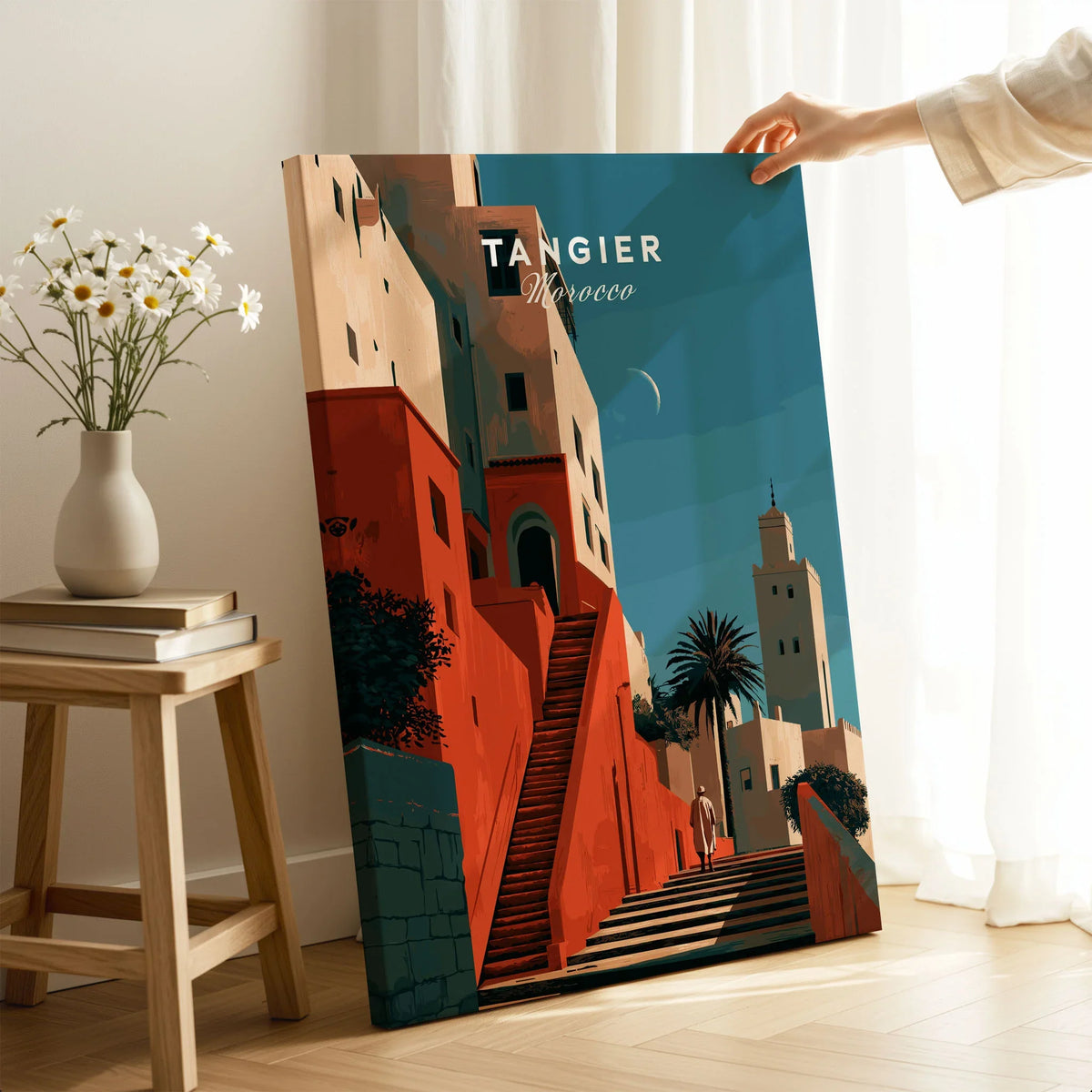 Tangier Morocco Kasbah Steps Travel Poster — coral kasbah steps climbing towards a minaret under a crescent moon, shown as canvas print mirror edge hand holding room setting