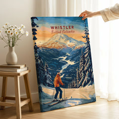 Whistler Travel Poster -  British Columbia on stretched canvas with mirror-wrap edges, held by hand in a room setting