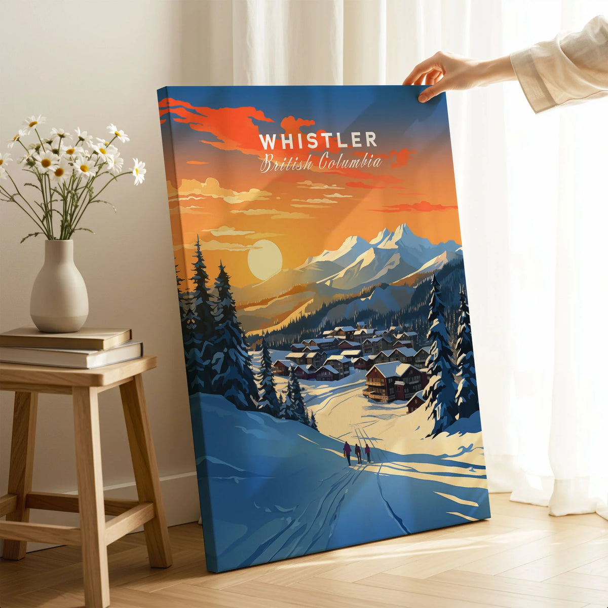 Whistler Wall Art Ski Print on stretched canvas with mirror-wrap edges, held by hand in a room setting