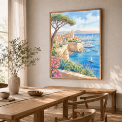 Antibes old town ramparts and harbour watercolour art print in a natural wood frame in a dining room