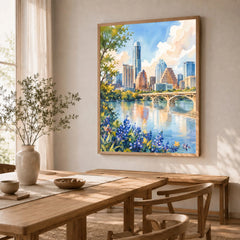 Austin skyline and Lady Bird Lake watercolour art print in a natural wood frame in a dining room