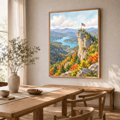 Chimney Rock State Park Chimney Rock above Lake Lure watercolour art print in a natural wood frame in a dining room