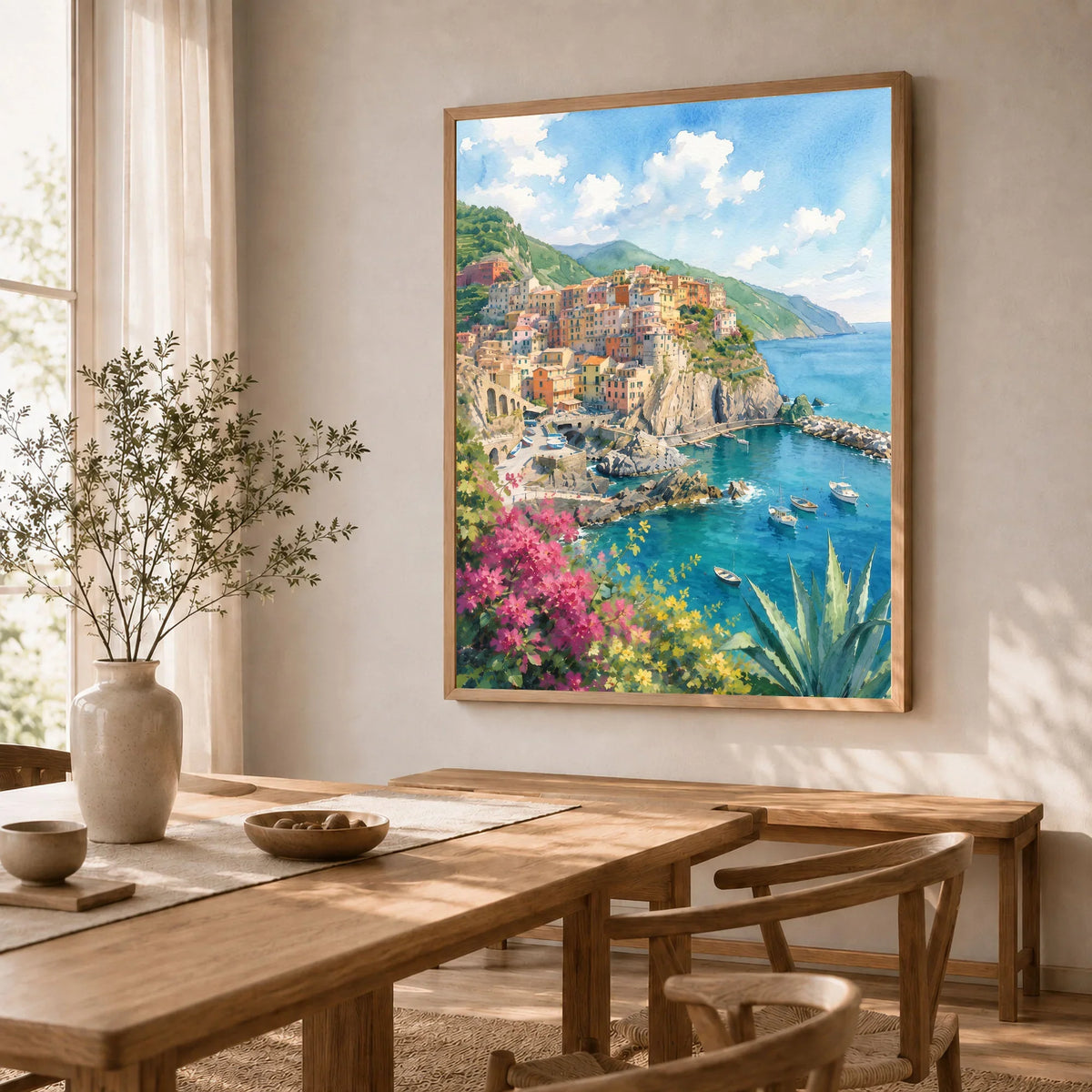 Cinque Terre Manarola cliff village watercolour art print in a natural wood frame in a dining room