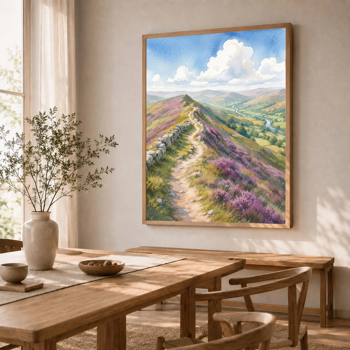 Clwydian Range heather ridge path watercolour art print in a natural wood frame in a dining room