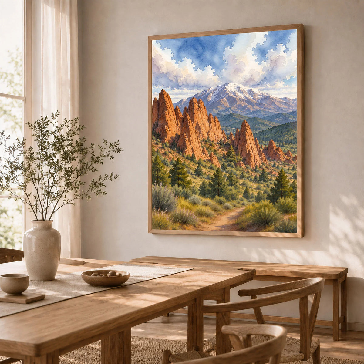 Garden of the Gods red rocks and Pikes Peak watercolour art print in a natural wood frame in a dining room
