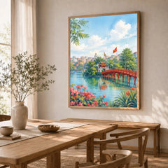 Hanoi red Huc Bridge on Hoan Kiem Lake watercolour art print in a natural wood frame in a dining room