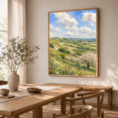 Kent Downs chalk downs and orchard blossom watercolour art print in a natural wood frame in a dining room