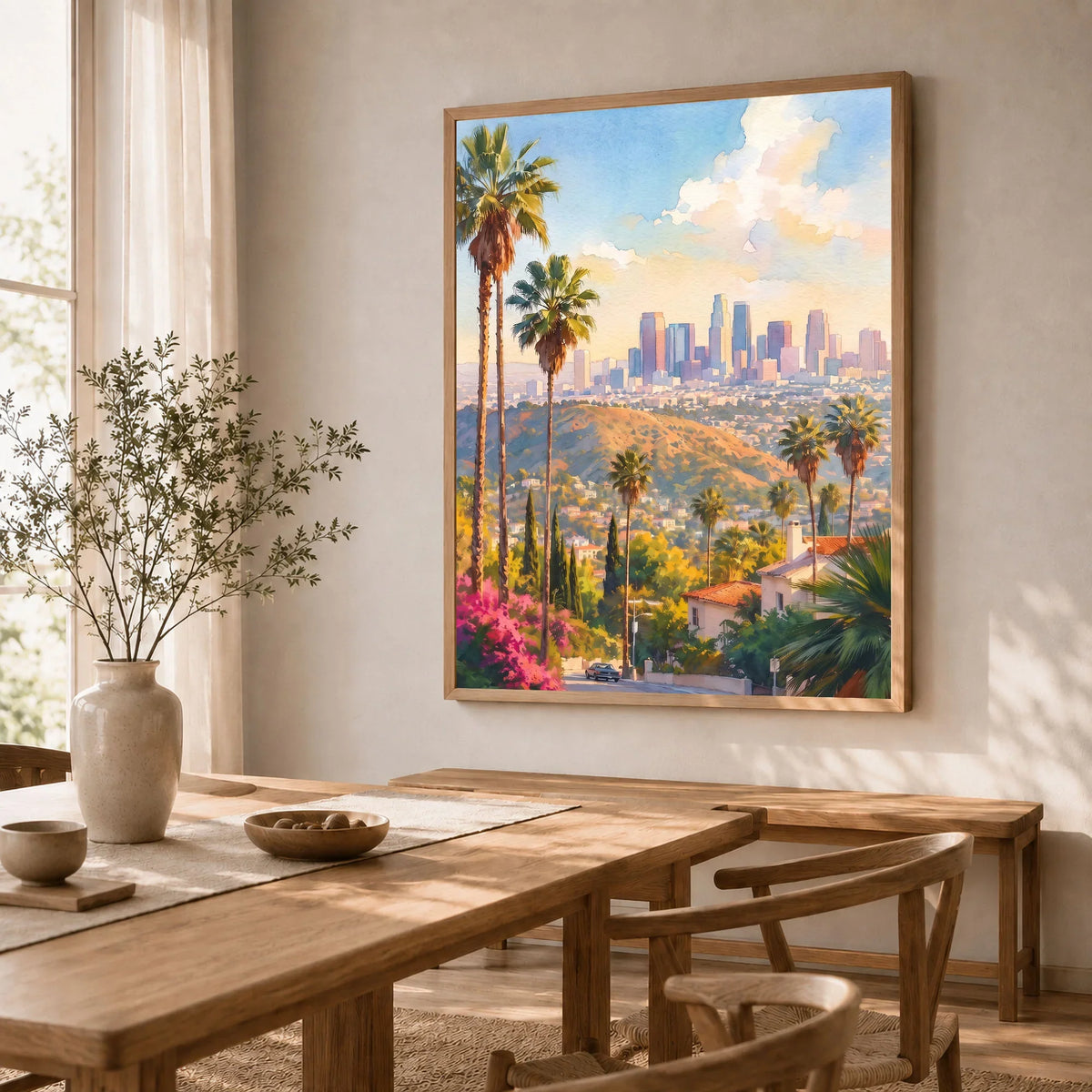 Los Angeles palm trees and downtown skyline watercolour art print in a natural wood frame in a dining room