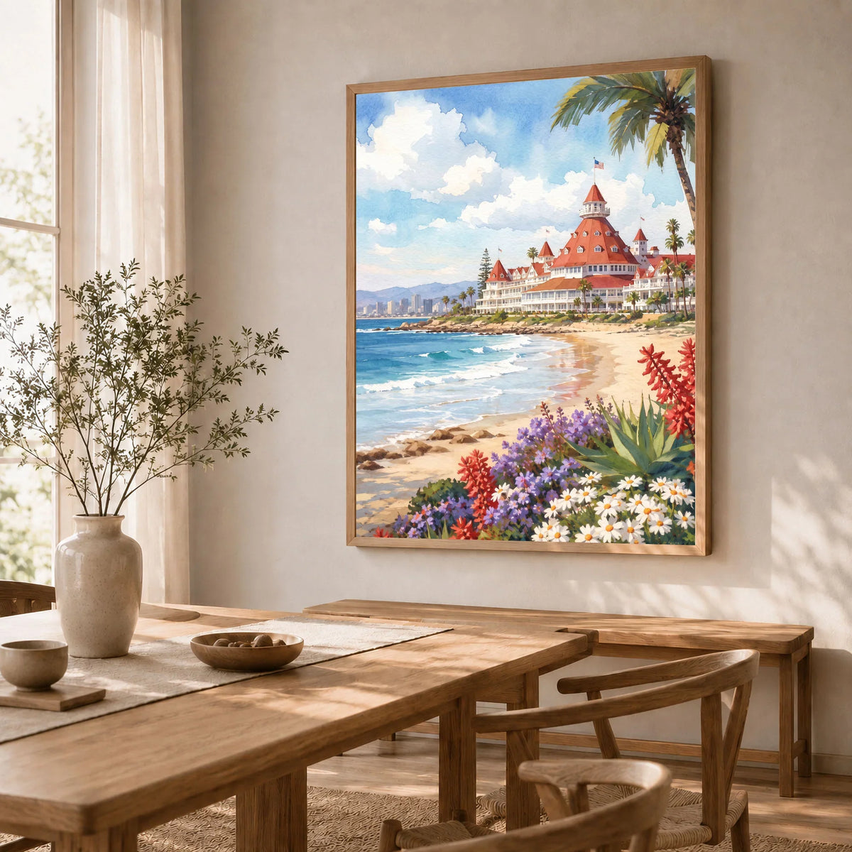 San Diego Hotel del Coronado and beach watercolour art print in a natural wood frame in a dining room
