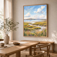 Solway Coast salt marsh estuary watercolour art print in a natural wood frame in a dining room