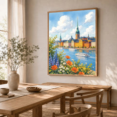 Stockholm Gamla Stan waterfront watercolour art print in a natural wood frame in a dining room