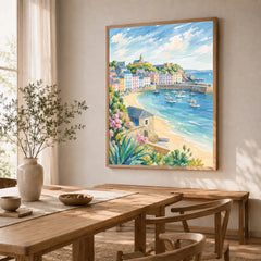 Tenby pastel harbour houses and beach watercolour art print in a natural wood frame in a dining room