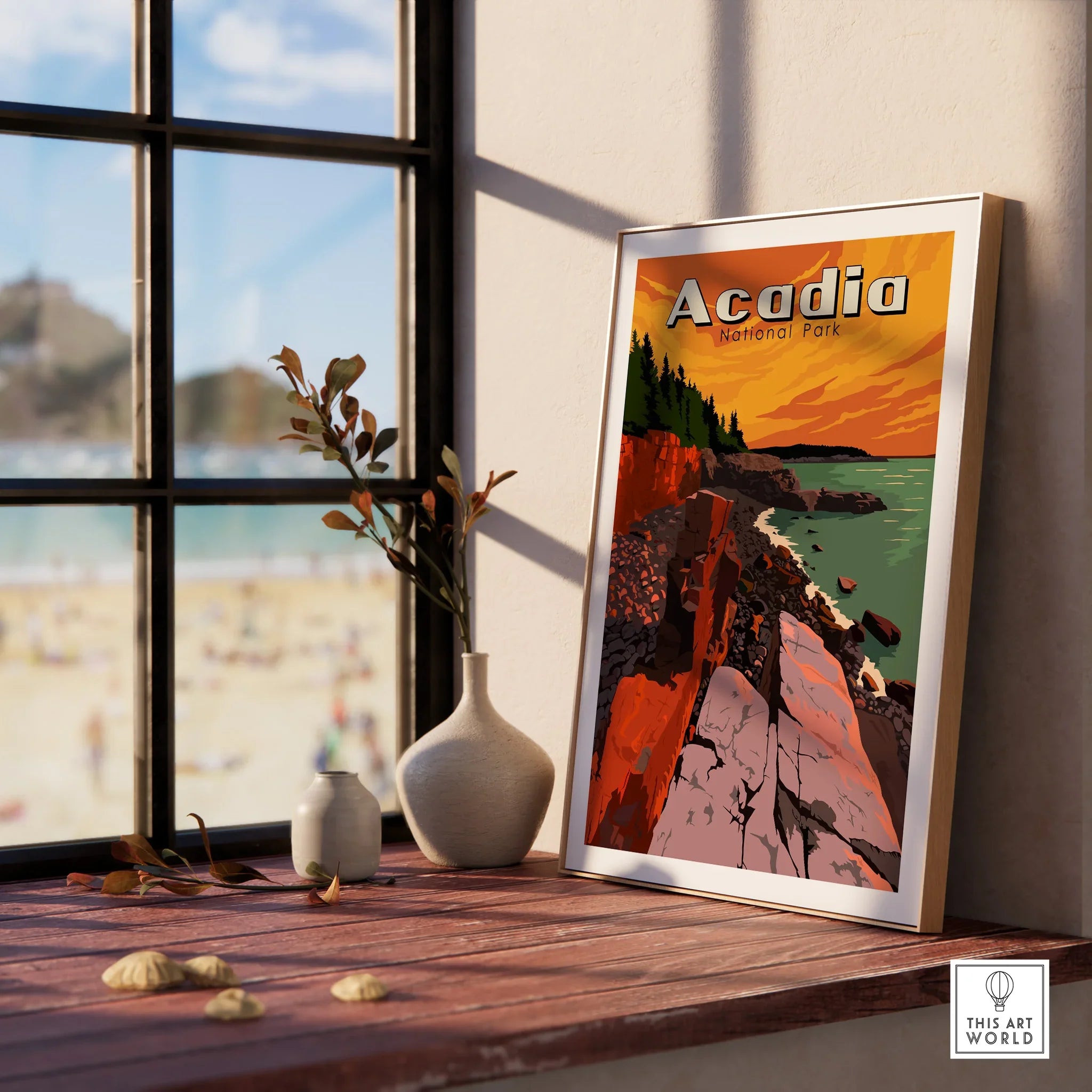 Framed Acadia National Park travel poster on windowsill with vases and coastal view