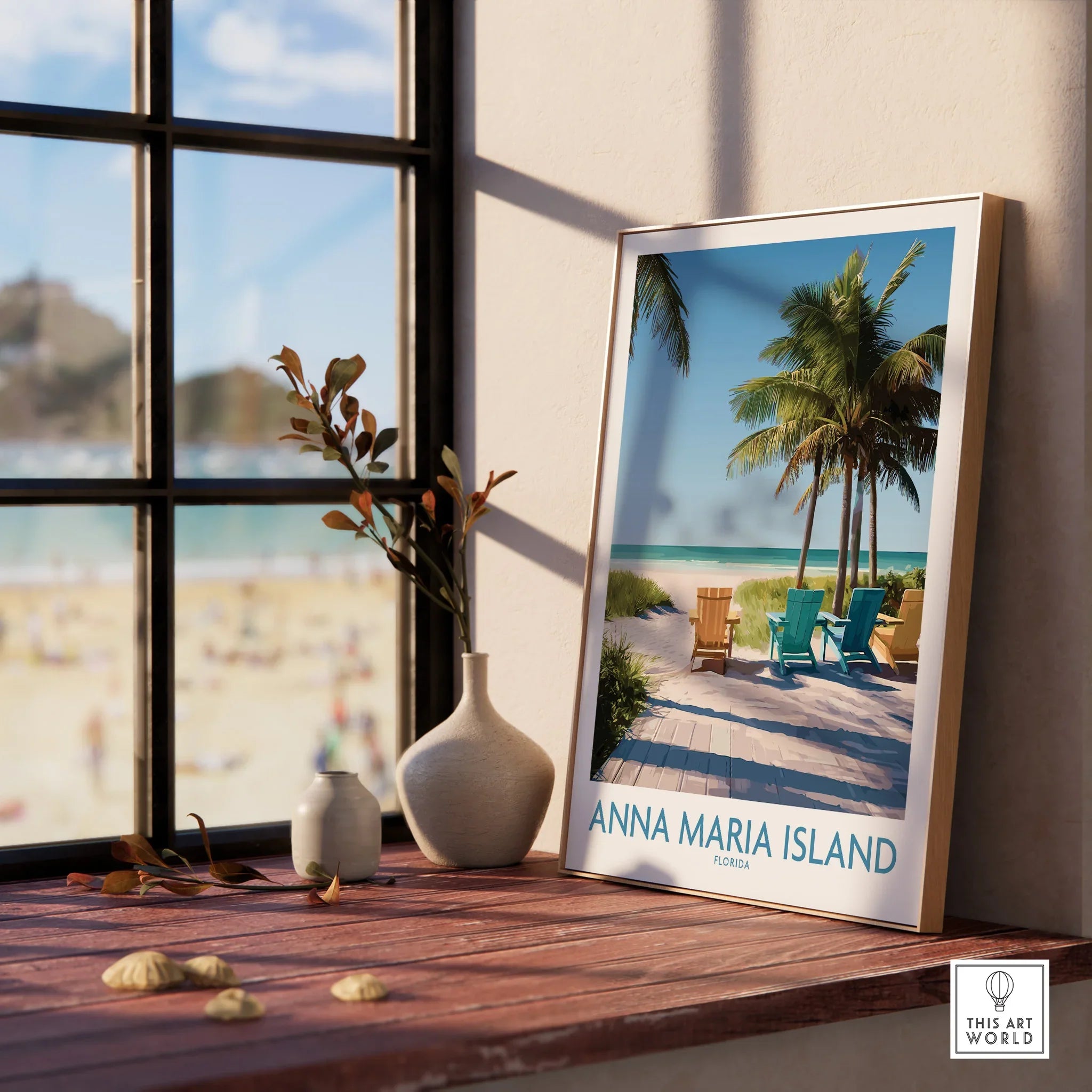 Framed Anna Maria Island travel poster with palm trees and beach chairs on a sunny windowsill.