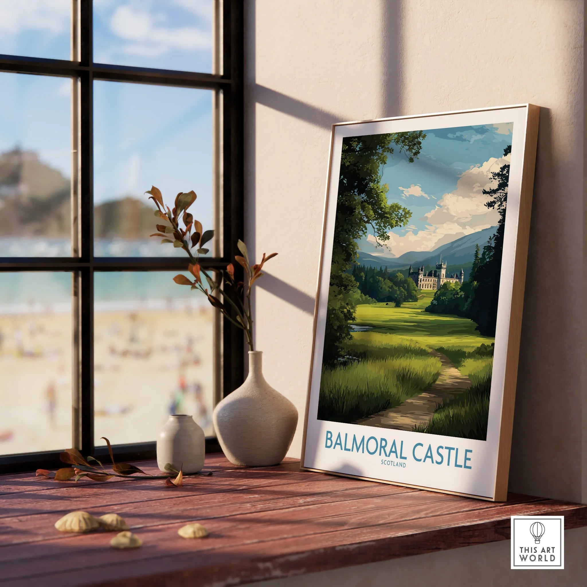 Framed Balmoral Castle travel poster on windowsill with vases, natural light, scenic view