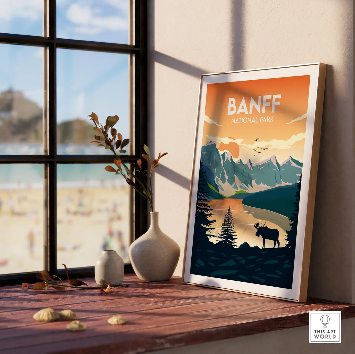 Framed Banff National Park print on windowsill with mountain landscape wall art