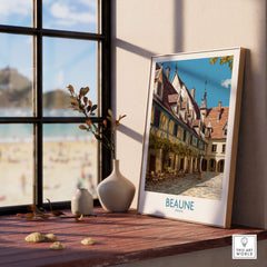Beaune France Print – Hospices de Beaune Wall Art displayed on a table near a sunny window.