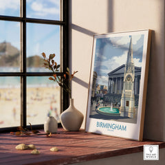 Framed Birmingham England city art print on wooden windowsill with vases, beach view outside
