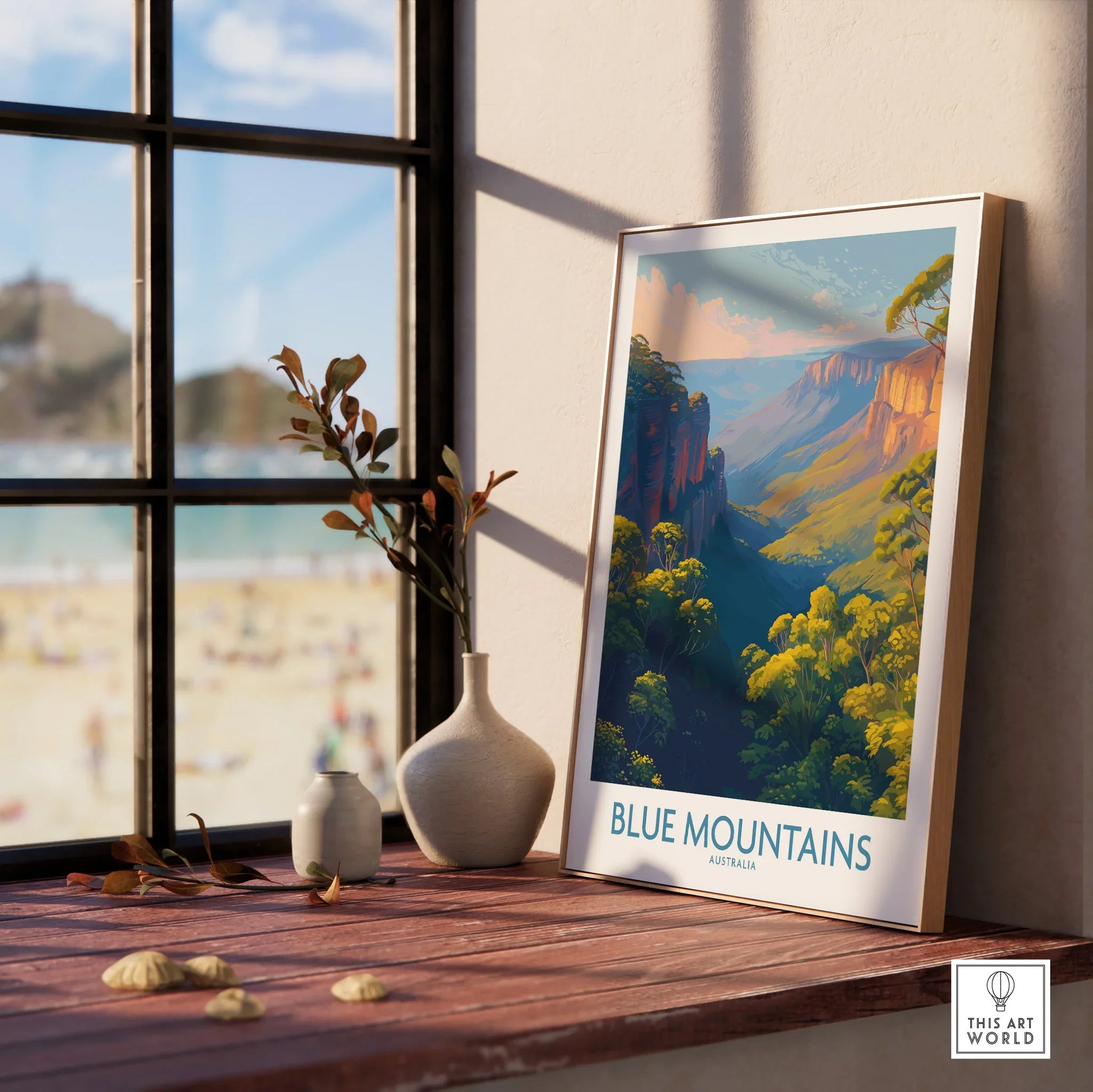 Framed Blue Mountains Australia travel poster on wooden windowsill with vases and natural light.