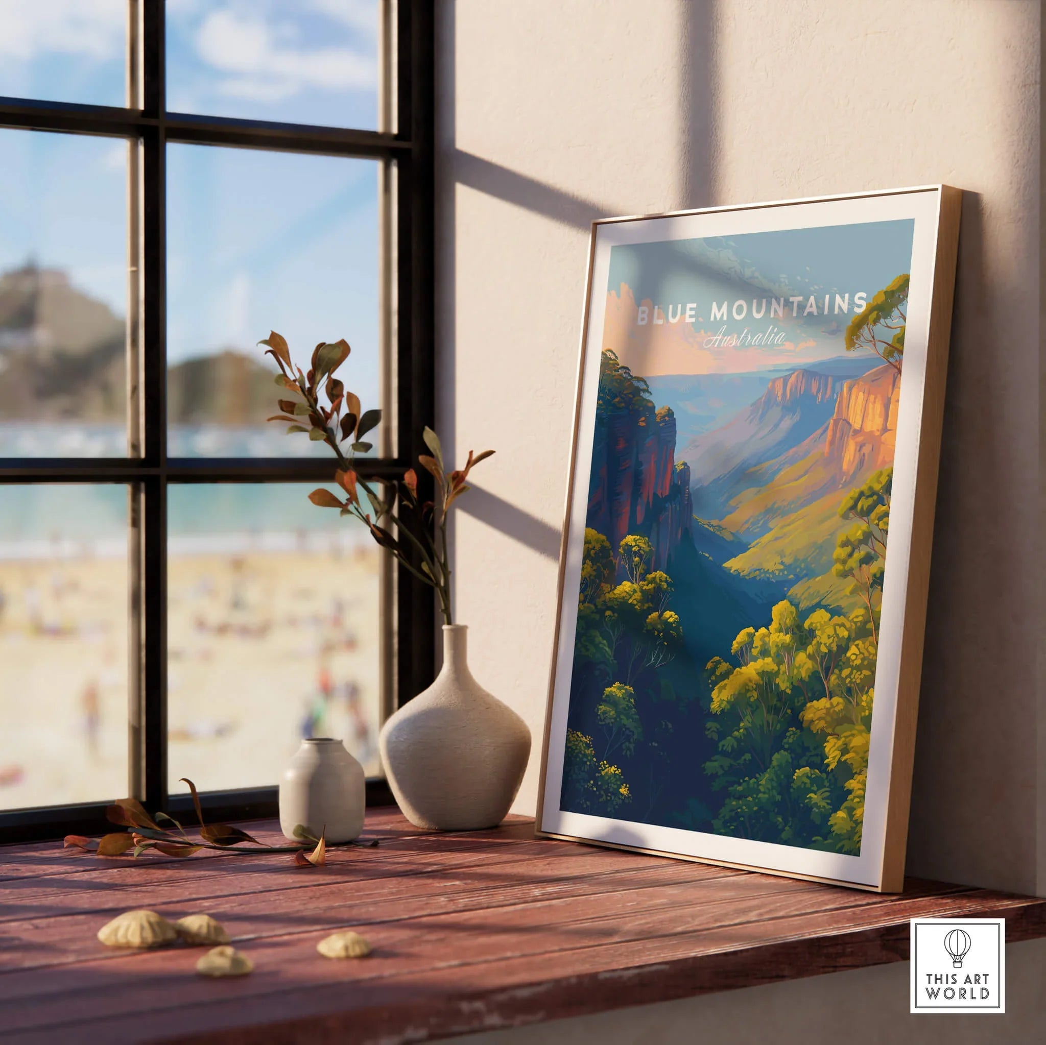 Framed Blue Mountains Australia travel poster on wooden windowsill with decorative vases.