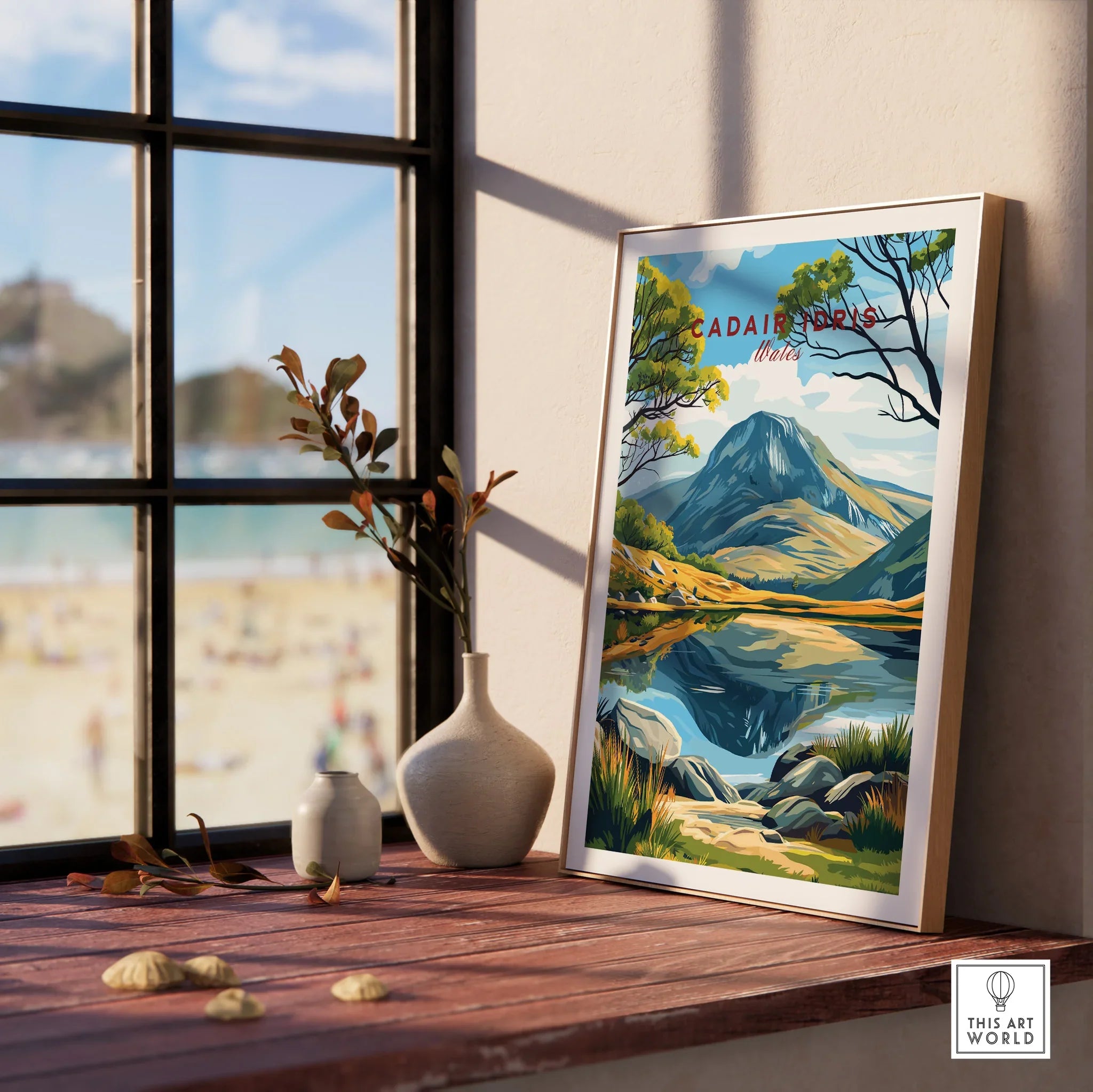 Framed Cadair Idris Wales travel poster on windowsill, landscape wall art and vases.
