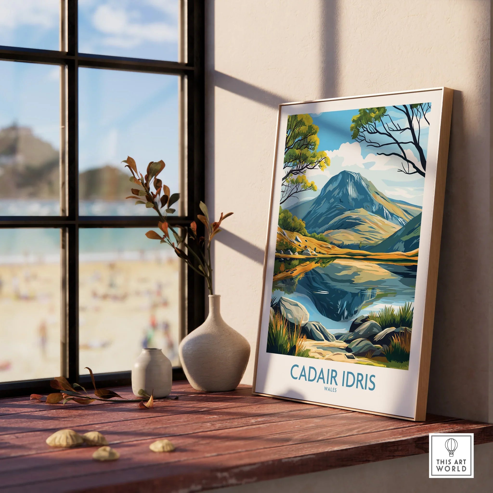 Framed Cadair Idris Wales art print on windowsill with vases, natural light, scenic view