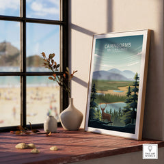 Framed Cairngorms National Park art print on windowsill with minimalist decor.