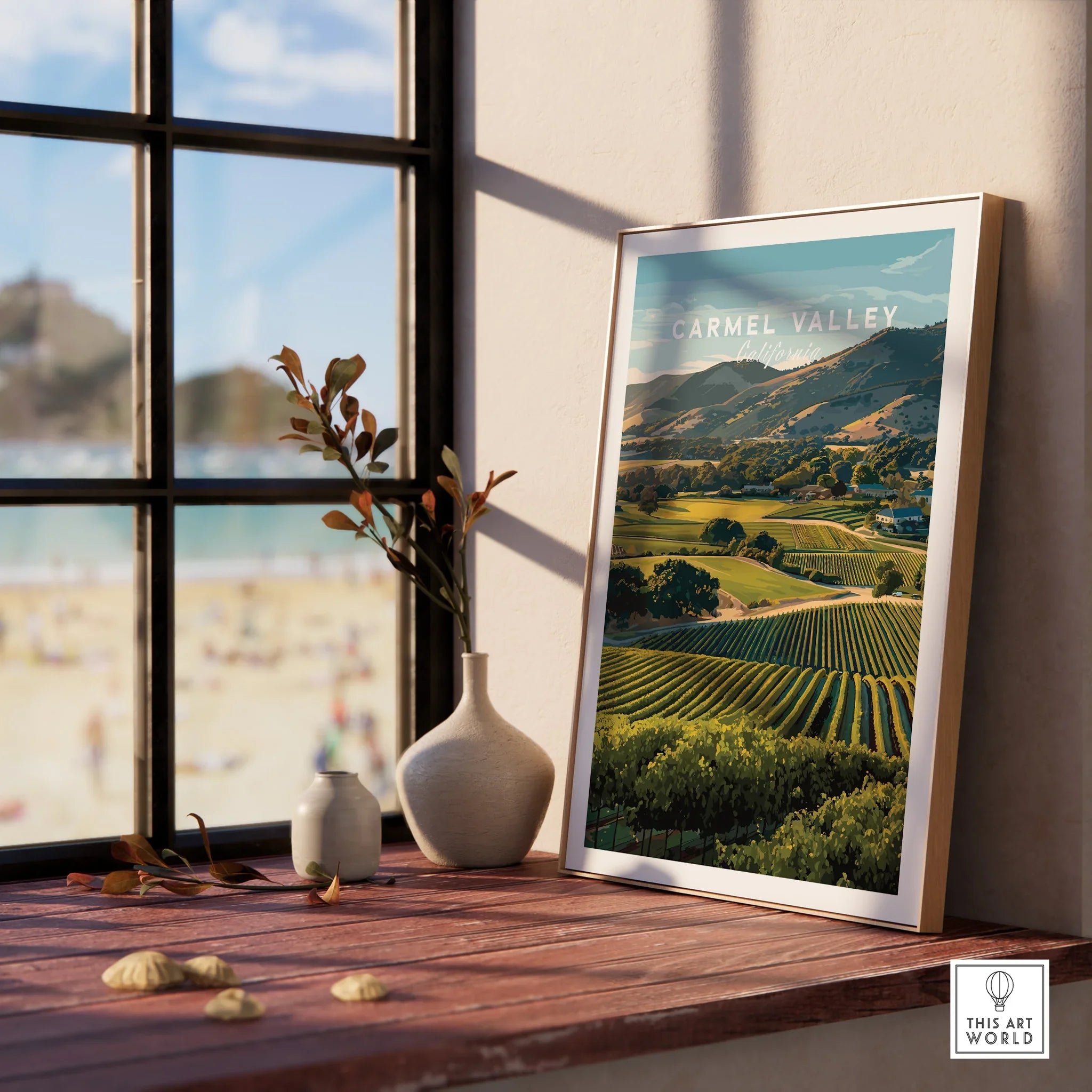 Framed Carmel Valley art print in natural wood frame on windowsill, vineyard landscape decor