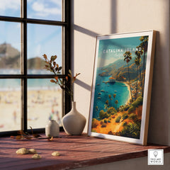 Framed Catalina Island travel poster with vases on a windowsill, beach view outside window