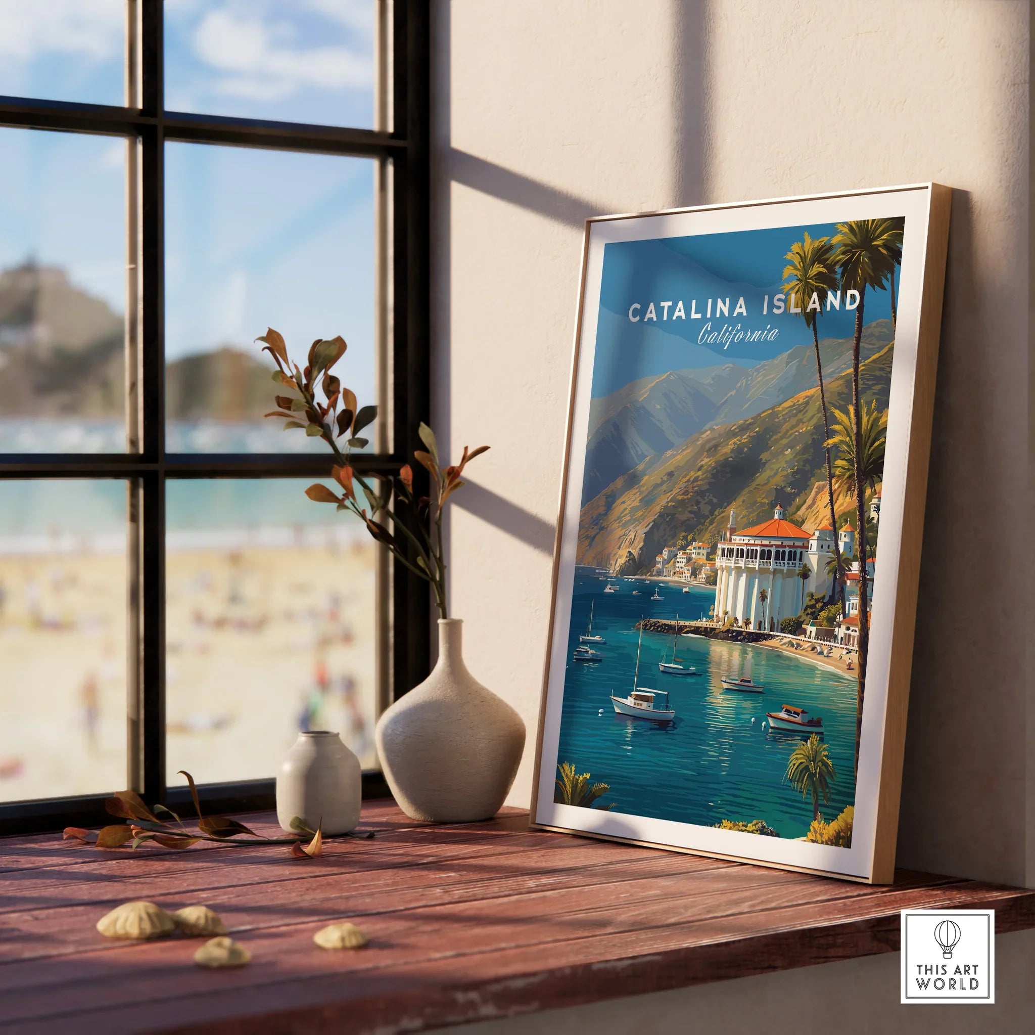 Framed Catalina Island travel poster with ocean view on sunny window sill, beach scene outside