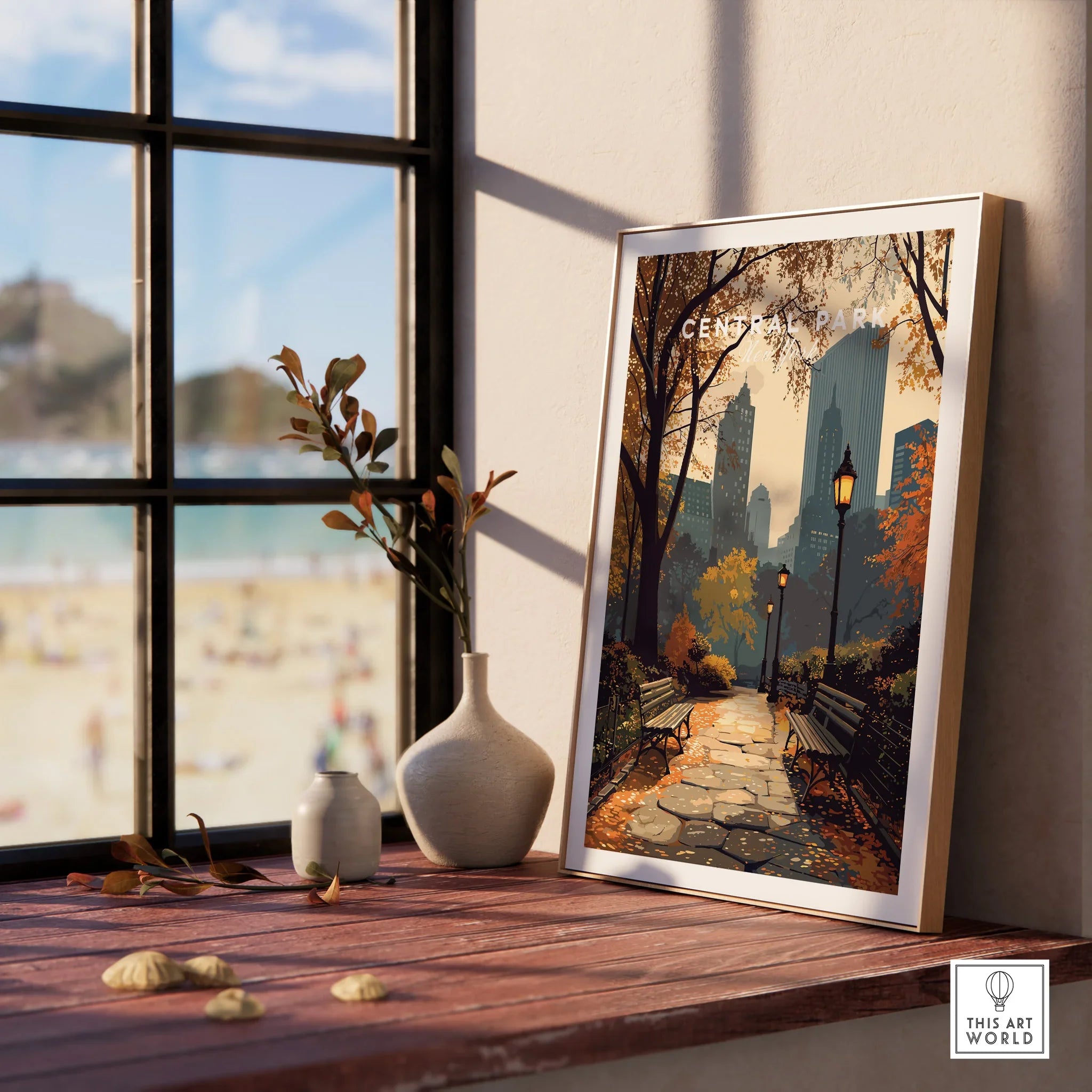 Framed Central Park wall art print with autumn trees, city skyline, on a windowsill with vases.