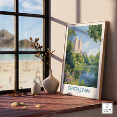 Framed Central Park art print on windowsill with vases, city and park scene visible indoors.