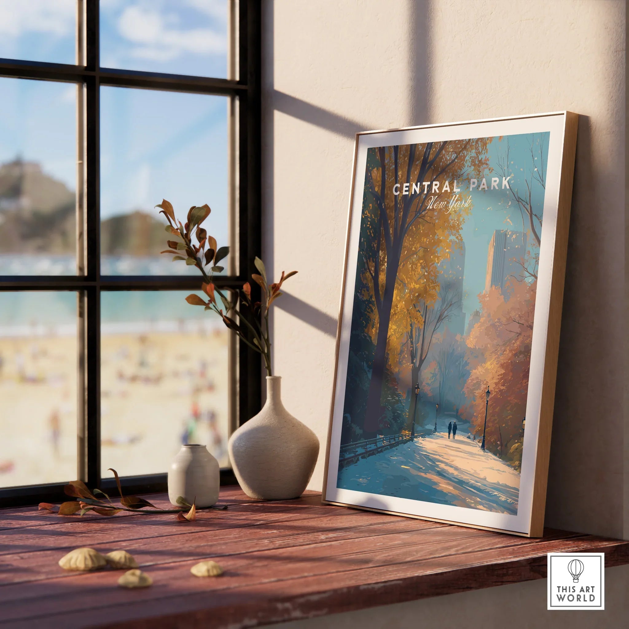 Framed Central Park print in natural wood frame on windowsill with vases, autumn cityscape art