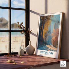 Framed Central Park art print with autumn trees on a windowsill, modern home decor.