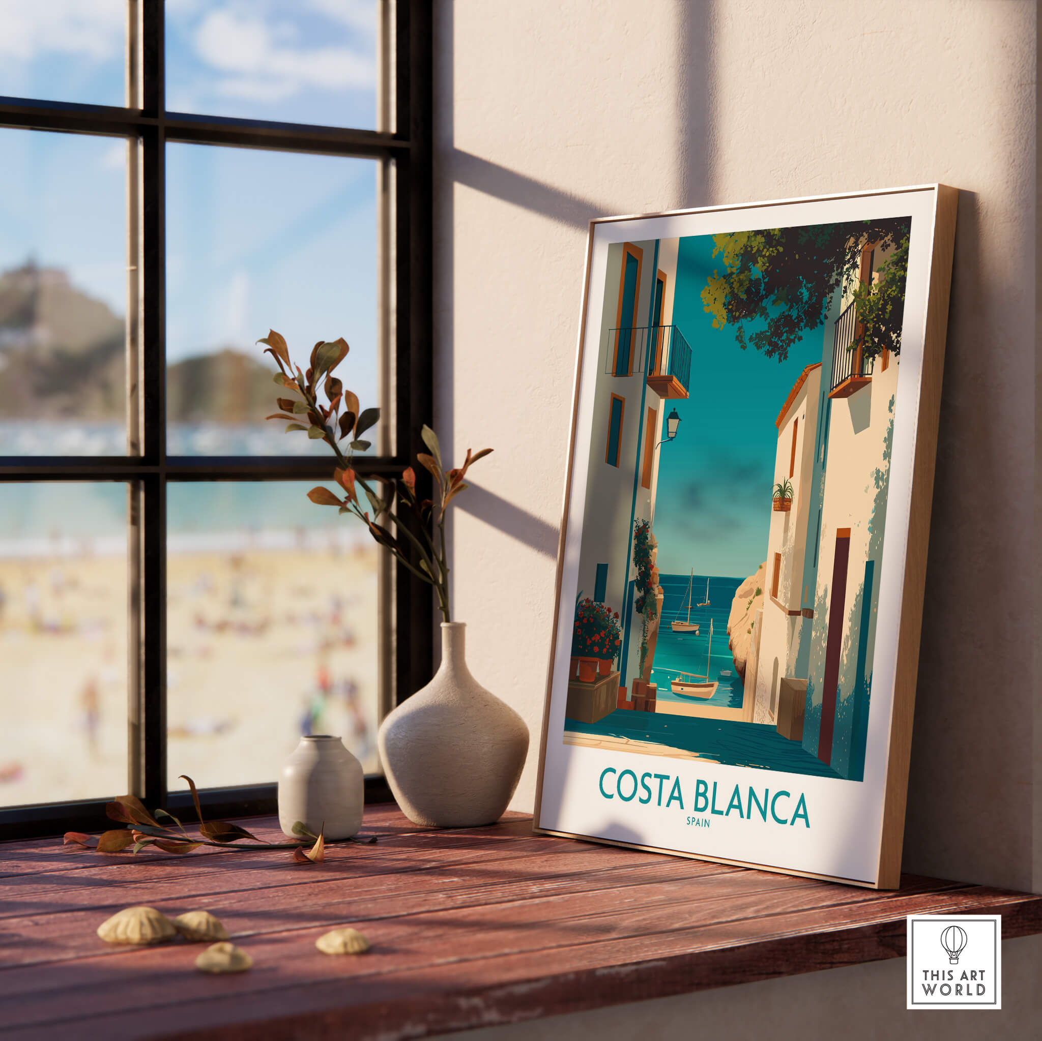 Costa Blanca Spain Wall Art Print - Spanish Village Artwork displayed on a wooden table near a window.