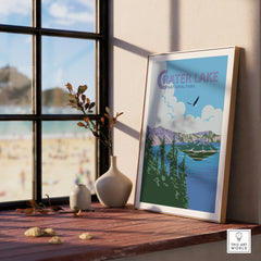 Framed Crater Lake National Park art print on window sill with beach view